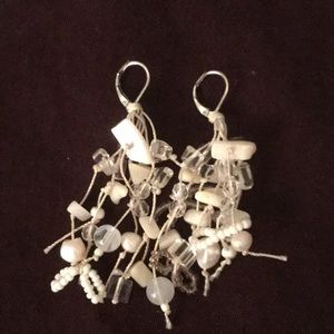 White dangly earrings